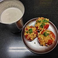Trikadugam juice and tomato tubs at Energy Home in Auroville