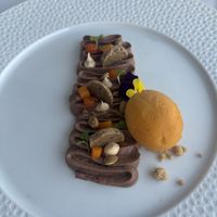 Chocolate tofu mouse with pumpkin sorbet  at The One Restaurant in Carvoeiro