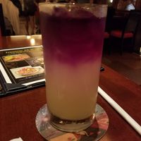 Yuzu lemonade (the yellow on the bottom) and blue pea (the purple on the top).  No alcohol.  Delicious! at Walt Disney World - Shiki-Sai: Sushi Izakaya in Lake Buena Vista