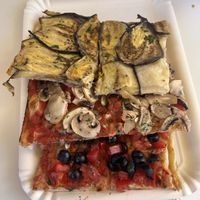 pizza with 1) aubergine 2) mushrooms and 3) olives and tomatoes  at Bella Mia in Ravenna