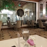 Tabla interior.  Big glass windows look out into the mall. at Tabla Indian - Winter Park in Winter Park