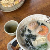 Miso soup and peanut butter and banana bread in the background   at Chay Station in Da Lat