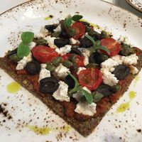 Puttanesca Pizza at Super Natural Kitchen in Dubai