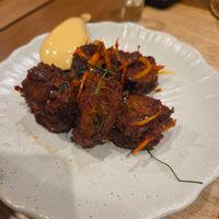 Stir fried Plant-Based cat fish with red curry at Sukjai by Pata Obasan in Chiang Mai