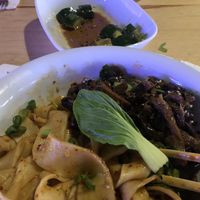 Biang Biang Noodles with Tofu + Mushrooms, Spicy Cucumber  at Yemyemy in Województwo Pomorskie