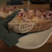 Sourdough bread with vegan grease and red onion  at Pelech in Trencianske Teplice