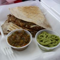Quesadillas (whole wheat tortilla, refried beans, vegan cheese, vegan chicken, served with salsa and guacamole). This is a good option if you don't feel like eating Middle Eastern cuisine, which is 57Cals' specialty. at 57 Cals in Laval