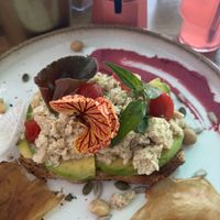 avocado toast with vegan protein chunks  at Wowzer Brunch & Restaurant in Punta Cana