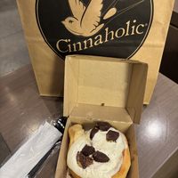 I built my own, with cream cheese frosting and peanut butter cups. Warm and yummy!  at Cinnaholic in New York City