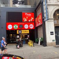 Front (some seating outdoors in front of 787 coffee) at Cinnaholic in New York City