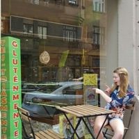 outside seating with view of cakes at Edes Elet Cukraszda in Budapest