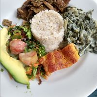Main plate: seitán, salad, plantain, acelga, rice at Flor de Loto in Bogota