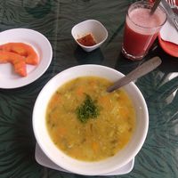 Papaya, quinoa soup, strawberry juice drink, tiny dessert at Flor de Loto in Bogota