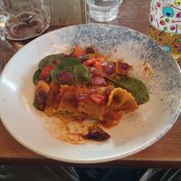 Truffle ravioli with spinach in a spicy tomato sauce. at Pembroke Primrose Hill London in London