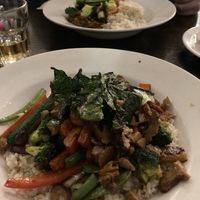 Yummy stir fry at front, curry in distance. Now that’s what I call a decent meal. 😊  at 222 Vegan Cuisine in West London