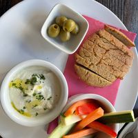 cheese dip made in-house and in-house gluten free bread at 222 Vegan Cuisine in West London