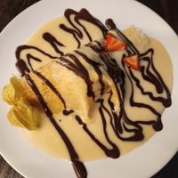 Pancake with ice cream and chocolate & vanilla custard. YUM at 222 Vegan Cuisine in West London