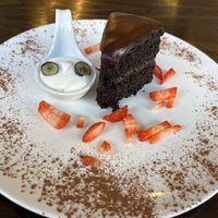 Chocolate gâteau with coconut whipped cream  at 222 Vegan Cuisine in West London