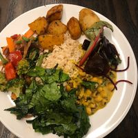 Veggies, potatoes, rice, chickpeas  at 222 Vegan Cuisine in West London
