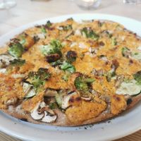 Pizza chamiola with extra broccoli. Verry good. Home made vegan cheese at Pizza Moji in Essen