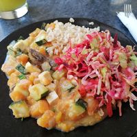 Thai curry, rice and salad  at Alfarroba in Lisbon