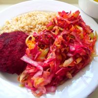 Chickpeas and beetroot hamburger with coleslaw at Alfarroba in Lisbon