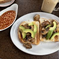Avocado and mushrooms on toast - extra beans  at Leah's Bistro in Gillingham