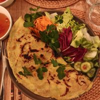 The very generous Banh Xéo crepes:
Crispy crepe with turmeric, topped with tofu, mushrooms, bean sprouts, salad, and raw vegetables. at Conscience - Vietnam in Paris in Paris