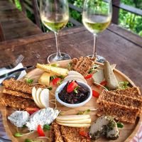 Fantastic cheese board & house wine at Santosa Vegan Restaurant in Phuket