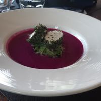 Dragon fruit gazpacho with 'cheese'. Raw and gluten free. at Santosa Vegan Restaurant in Phuket