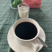 Hot Lao coffee with oatmilk   at Amazing Vegan Food in Vang Vieng