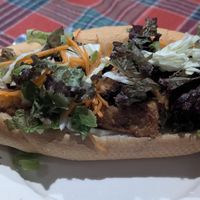 Tofu sandwich 😍 deep fried tofu with Salad and vegetables at Amazing Vegan Food in Vang Vieng