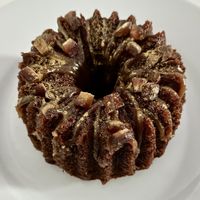 Individual sticky date cake   at The Lime Tree Cafe & Kitchen - Al Qudra   in Dubai