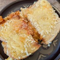 Photo doesn't do it justice - kimchi and vegan cheese toastie!! at The Garden Coffee House in Hexham