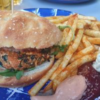 Tofu burger, fries and vegan sauces at Gartenbeiz zum Gaul in Zurich