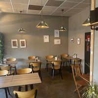 Step inside and unwind 🌿

Our indoor seating offers a cozy, minimalist space with warm wooden accents and a calm, inviting atmosphere. Perfect for enjoying your favorite coffe at OOFT Coffee in Berlin