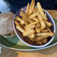 Jalapeño burger on sourdough bread with a side of fries: tasty, but spicy. The fries were very good. at Hans Im Gluck - Rembrandtplein in Amsterdam