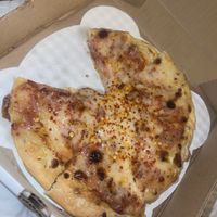 This was quite yummy. Small vegan pizza with vegan tomato sauce that they only recently got in stock.  at North Face Pizza in Jasper