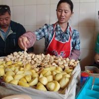 A staff member takes care of grilling the food, while counting how many pieces each diner eats. You just help yourself, and when you're done they'll tell you how much you owe. at Wenjun in Jianshui