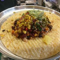 Tomato Tortilla (there are 3 options)
Before rolling: Chilli con crane, kidney beans, mexican rice, guacamole, salsa, spicy sauce 
I am quite surprised I remember everything. at Pancho's Burritos in Manchester