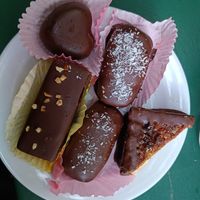 Various vegan desserts from the counter at Weingut Feuerwehr Wagner in Vienna
