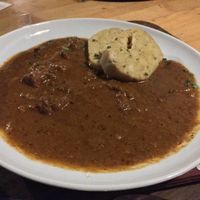 goulash with potato dumplings  at Weingut Feuerwehr Wagner in Vienna