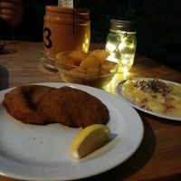 Vegan schnitzel, potato salad and 'fried potatoes' at Weingut Feuerwehr Wagner in Vienna