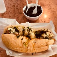 Roasted cauliflower poboy and mustard greens at Killer Poboys in New Orleans