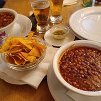 Vegan chili beans, nachos with jalapeno sauce at Serrano Saloon in Baja