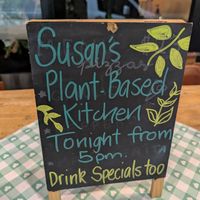 Signage at Susan's Plant Based Kitchen in Mermaid Beach