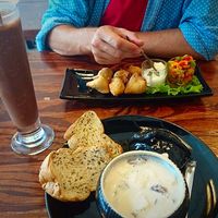 cream of mushroom soup and samosas  at Mango in Bangkok