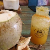 Passion fruit cordial and fresh coconut at Mango in Bangkok