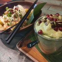 Green Fiber smoothie topped with pumpkin seeds and acai. at Mango in Bangkok