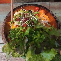 Som Tum (cold Green papaya salad) with fruit and veggies. The spicy sauce was on bottom so that was a surprise. at Mango in Bangkok